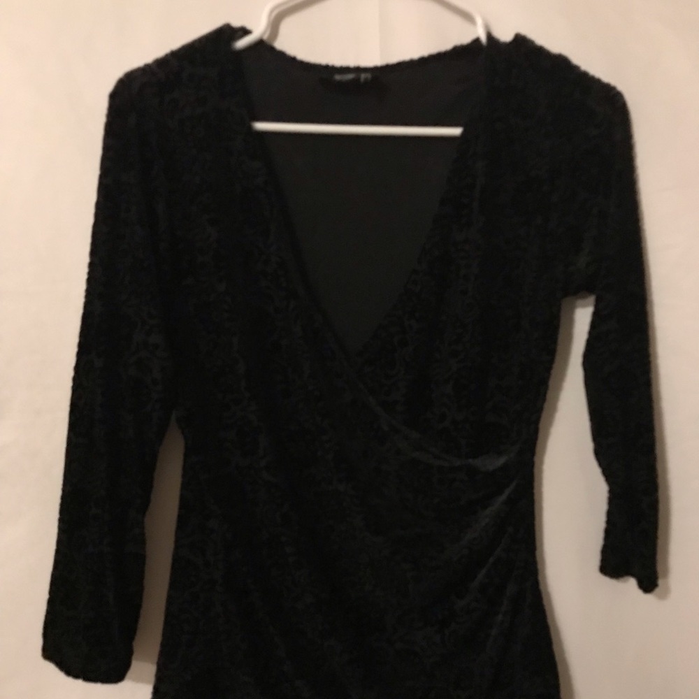 Wrap style blouse by clothing company size small
